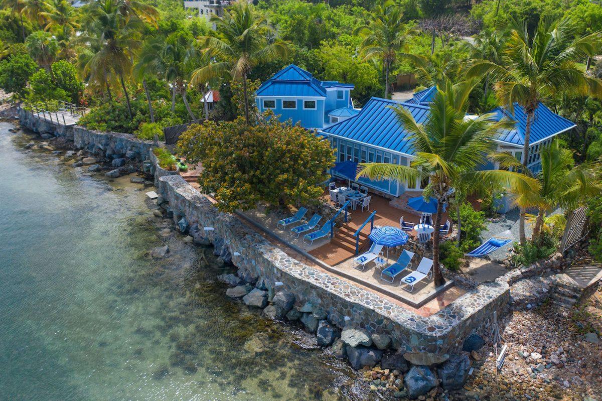 Aerial view of C'est La Sea villa on Great Cruz Bay, St. John, with pool and sandy ocean access
