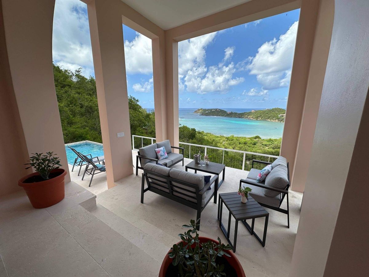 Cocoa Reef, a modern hillside villa with a pool and ocean views over Fish Bay, St. John
