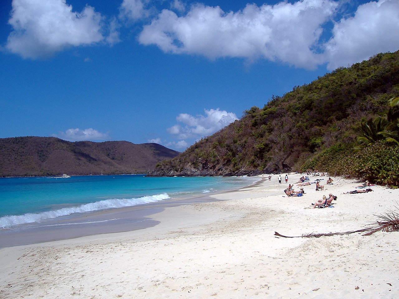 Cinnamon Bay beach on St. John with white sand and green hills